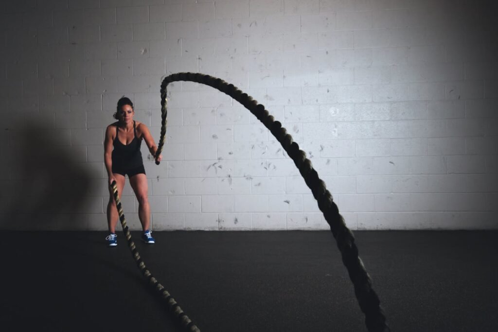 Women doing battle rope